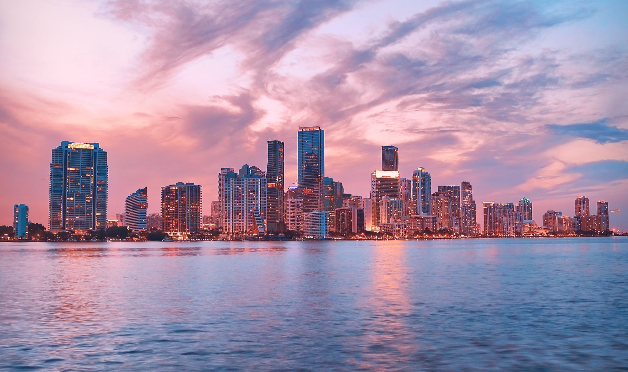 An image of the downtown austin skyline across a lake